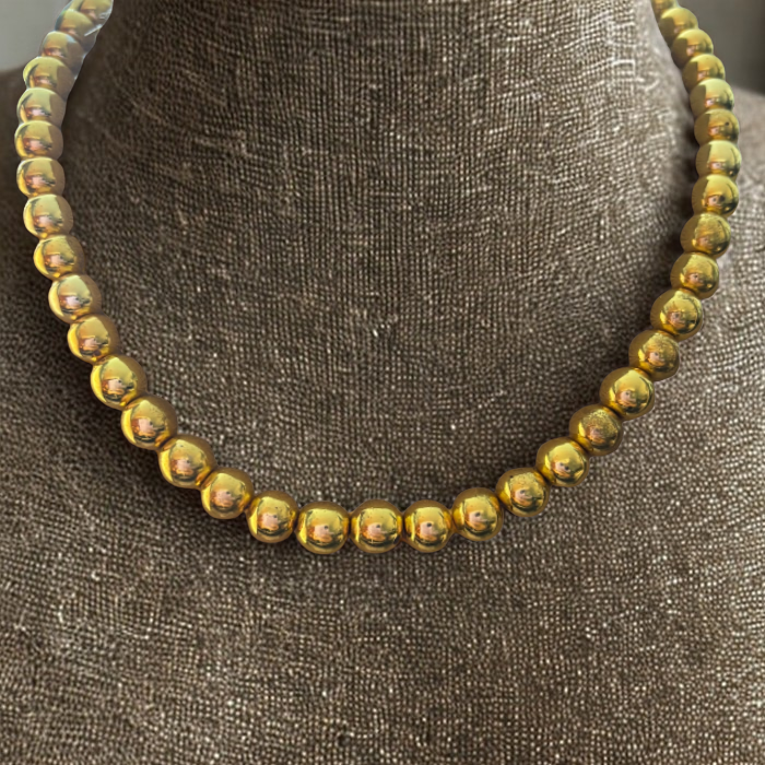 Gold Hematite Gemstone Necklace featuring polished round beads for a stylish look