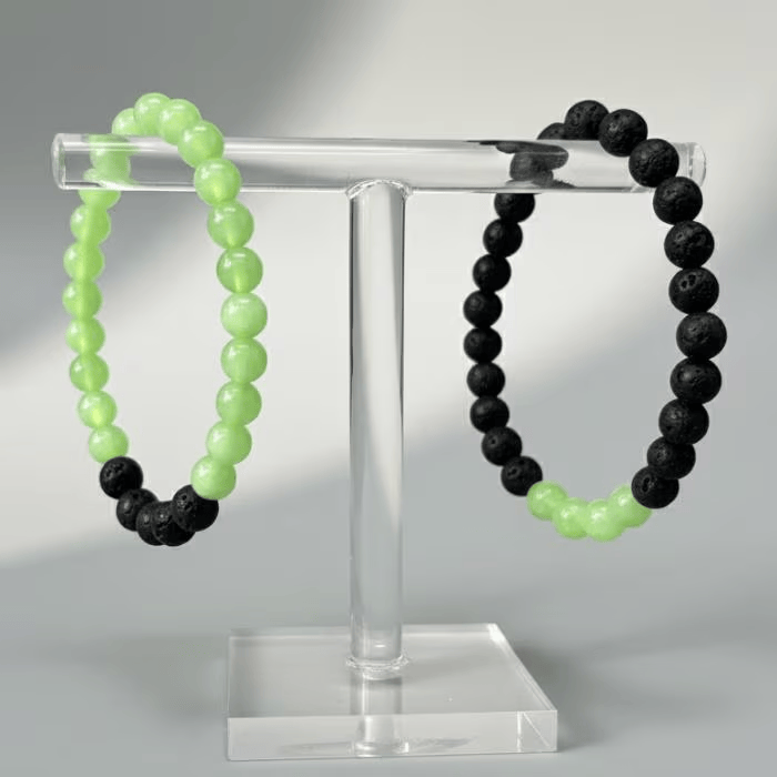 Heart Chakra Bracelets featuring green beads and black lava stones for healing and balance
