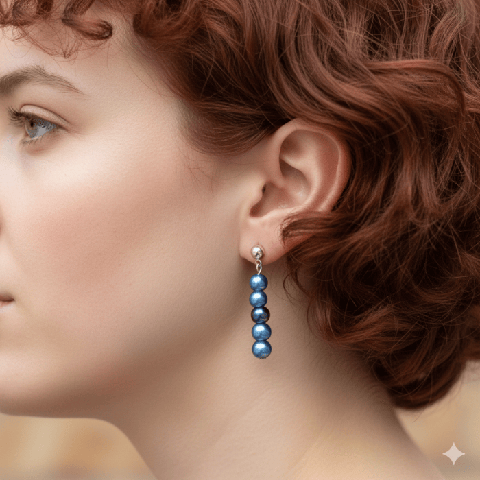 Elegant Long Stud Drop Earrings with Blue Beads, showcased on a model with curly hair