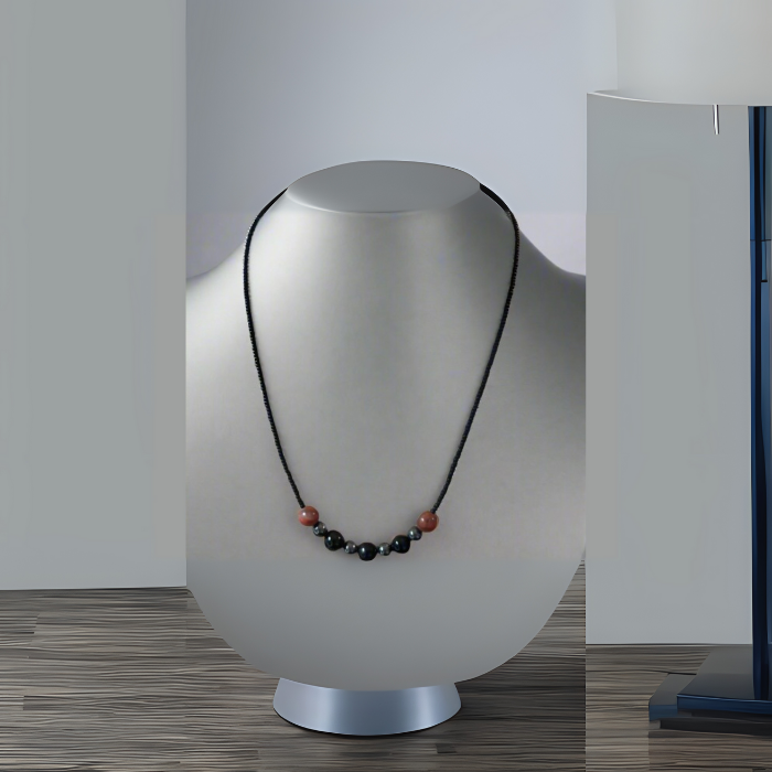 Minimalist Spiritual Protection Necklace featuring black and red beads on a sleek black cord