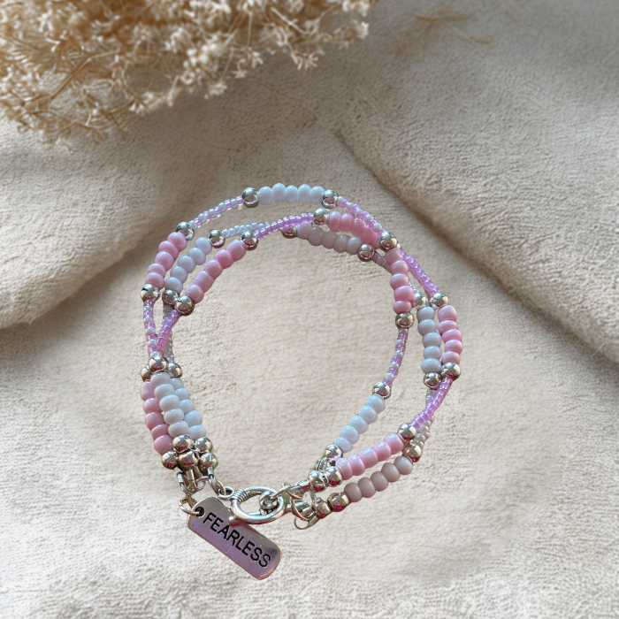Pink Fearless Wrap Bracelet featuring colorful beads and a silver charm for a trendy accessory