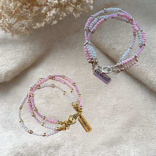 Pink Fearless Wrap Bracelet featuring colorful beads and a charm for stylish accessorizing