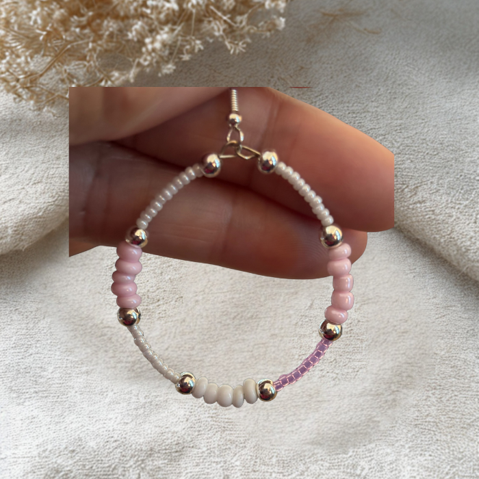 Pink Seed Bead Hoop Earrings with silver accents and a vibrant design