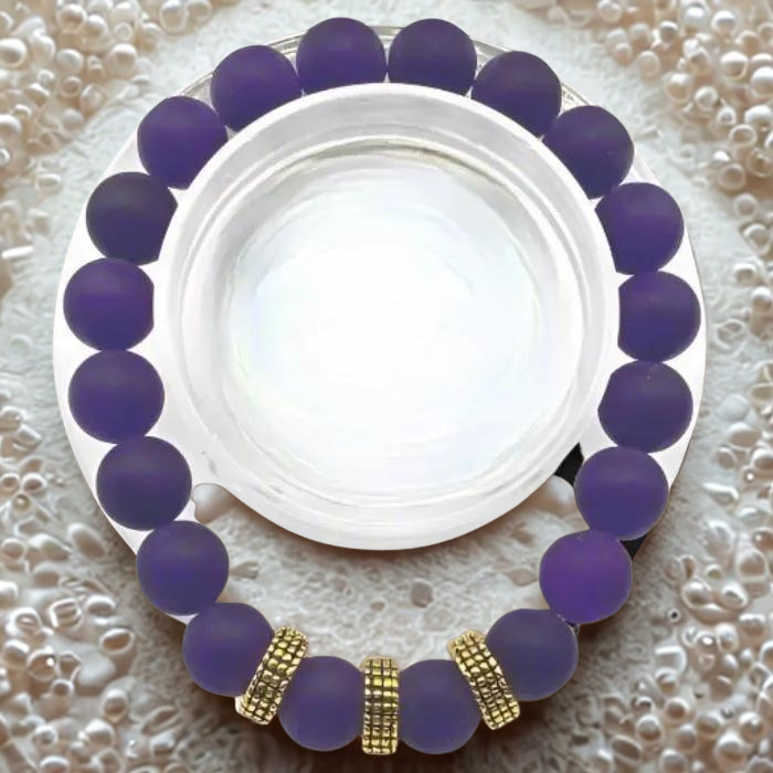 Purple Reigns Supreme Purple Jade Gold Accent Bracelet with smooth beads and elegant gold accents