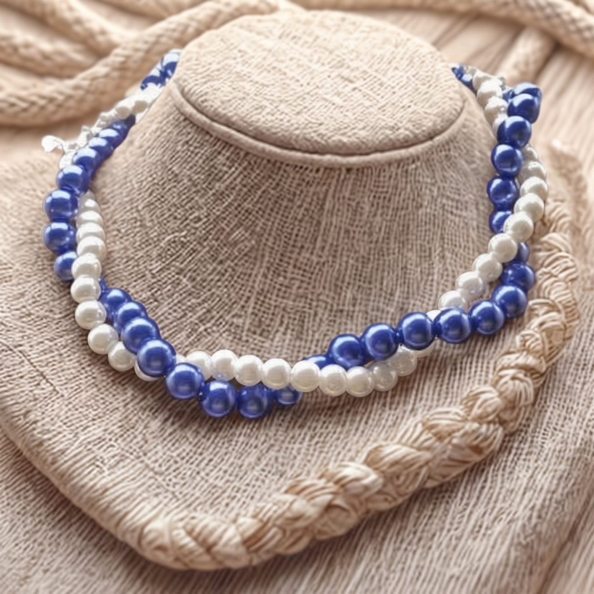 Royal Blue Pearl Twisted Necklace featuring alternating royal blue and white pearls for a stylish look