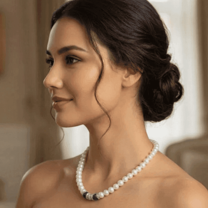 Royal Blue Rhinestone and White Glass Pearls Necklace worn elegantly with a classic hairstyle