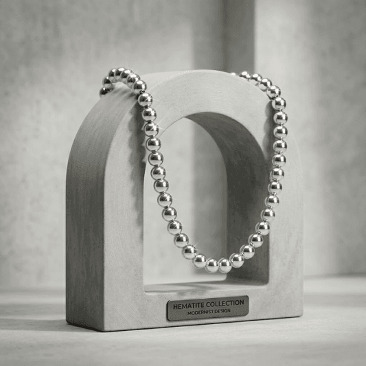 Stylish Silver Hematite Necklace displayed on a modern concrete stand from Peace N Beads Design