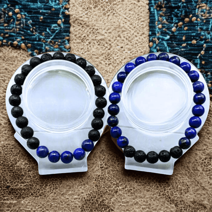 Two Third Eye Chakra Bracelets featuring black lava stones and deep blue lapis lazuli beads