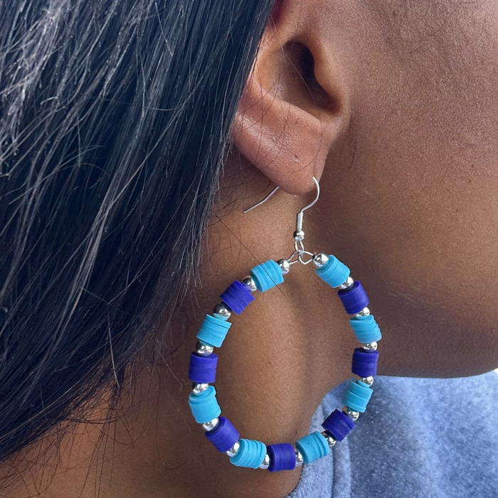 Sky and Royal Blue Three Strand Bracelet with Earrings featuring colorful beaded design on a model