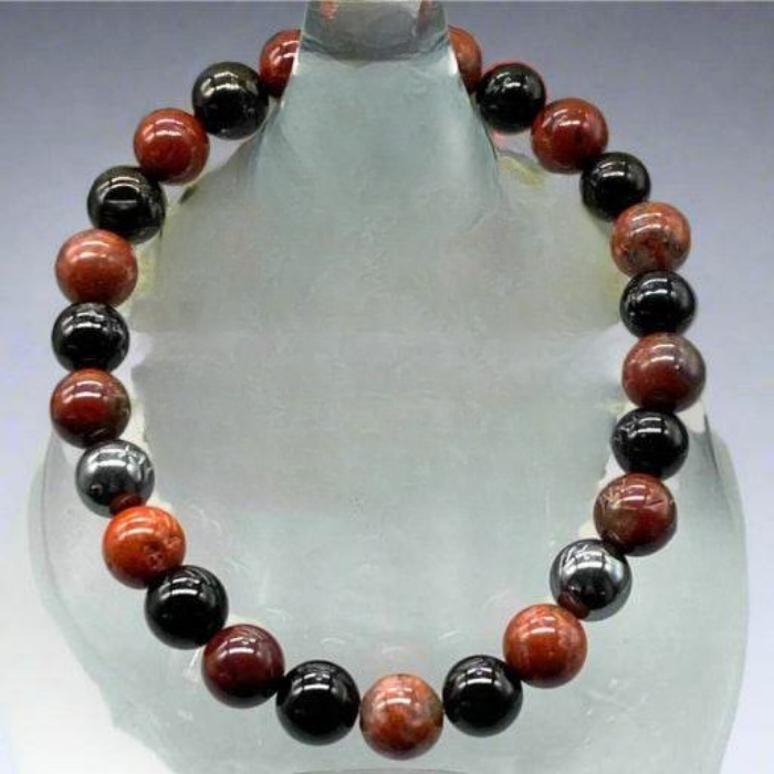 Spiritual Protection Gemstone Bracelet featuring red and black stones for healing and energy balance