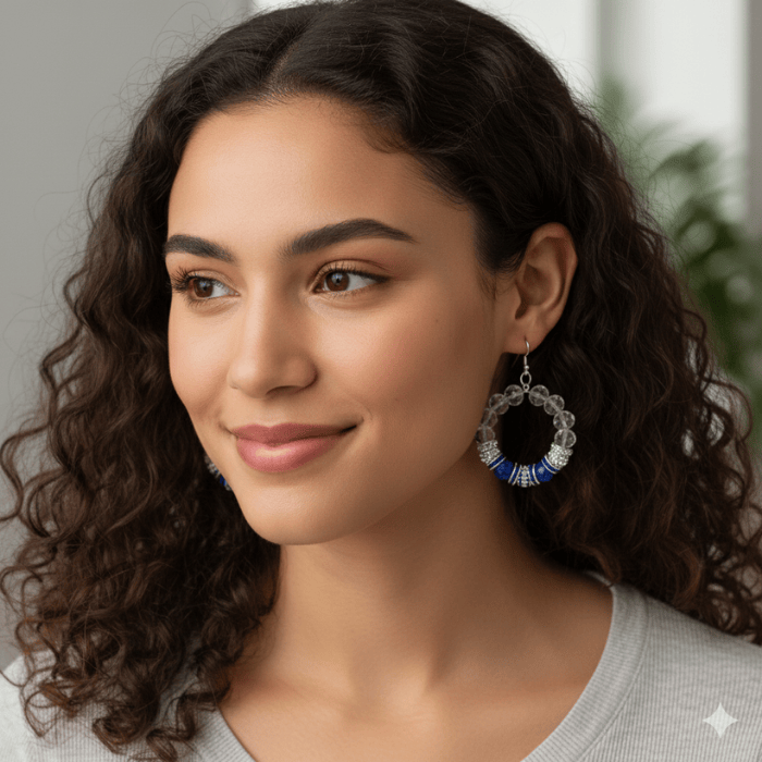 Stunning Beaded Hoop Earrings in blue and silver, worn by a model with curly hair, complementing her casual style