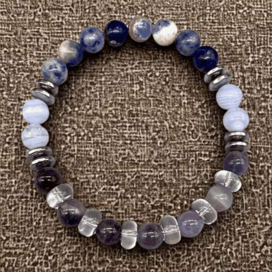 Serenity Infusion Gemstone Bracelet with blue lace agate, amethyst, hematite, sodalite, and clear quartz stones.